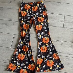 Free People Black Bell-Bottom Leggings with Orange Floral Print